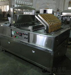 XRT 2014自動杏仁撻注芯機產品圖片展示 - 江門市蓬江區杜阮萬勝食品機械廠